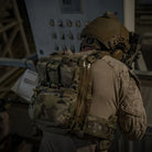 Operator wearing Ferro Concepts ADAPT Back Panel Water during field operations with hydration integrated directly into the rear of the carrier
