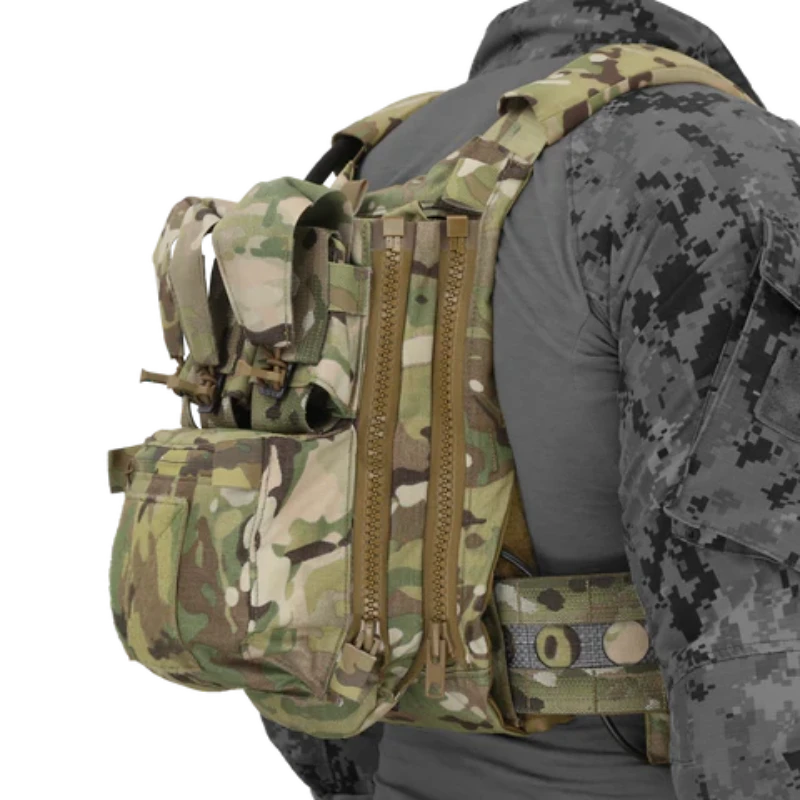 Side profile of Ferro Concepts Back Panel Banger installed on plate carrier showing low profile storage and secure fitment