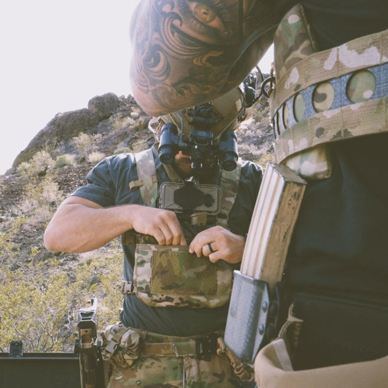 Ferro Concepts Chesty Rig Harness Wide in MultiCam worn fully kitted in the field with pouches and magazines. Modular tactical chest rig harness for military, law enforcement, and range training. Built for mobility, durability, and mission use.