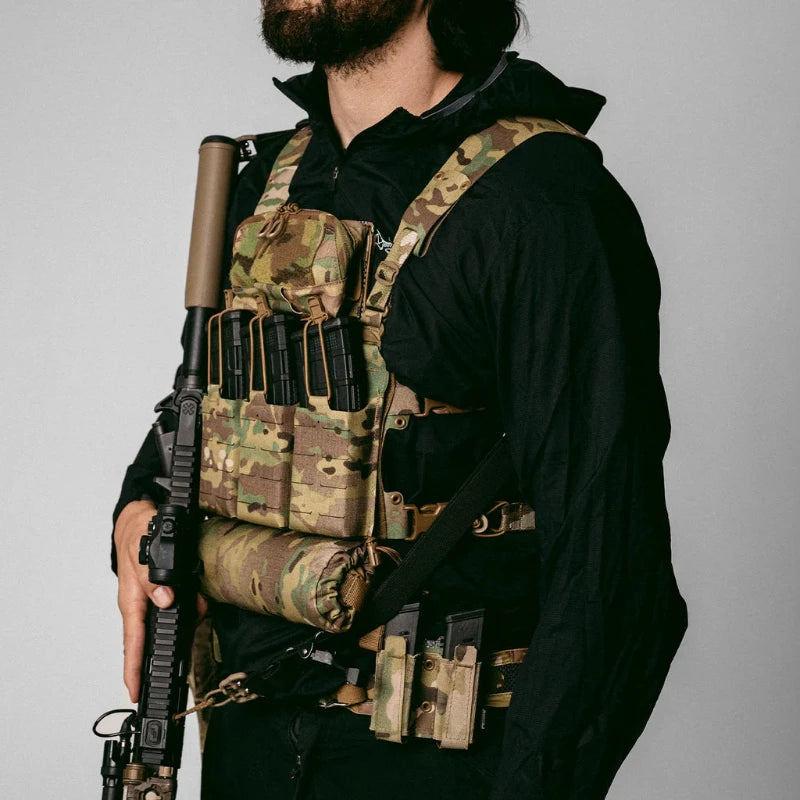 Side profile of a user wearing the Ferro Concepts Chesty Rig Mini V2 chest rig during firearms training, highlighting its low-profile fit and modular setup.