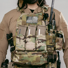 Operator wearing plate carrier equipped with Ferro Concepts KTAR Front Flap showing streamlined triple magazine setup