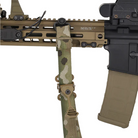 Ferro Concepts Pull Tab Kit installed on a Slingster sling attached to a rifle, allowing faster sling adjustments and improved control.