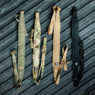 Ferro Concepts Slingster® Sling shown in multiple colorways. Modular, combat-ready rifle sling with quick-adjust pull tab, padded comfort, and one or two-point configuration options.