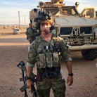 Ferro Slickster BASE plate carrier shown worn with full tactical kit and cummerbund attachment – customizable platform for elite duty setups