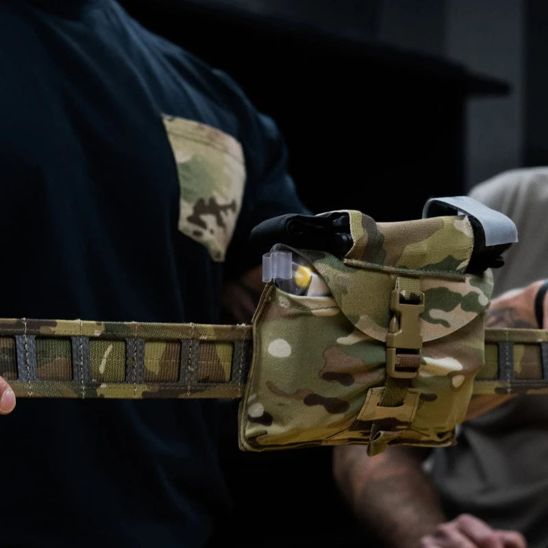 GBRS Group IFAS Individual First Aid System Pouch installed on kit during range training showing quick access emergency readiness