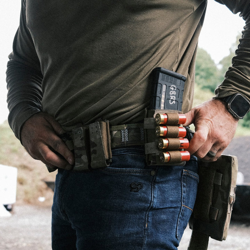 GBRS Group Shotgun Shell Sleeve in use during range session showing fast shell draw from mag pouch mounted sleeve