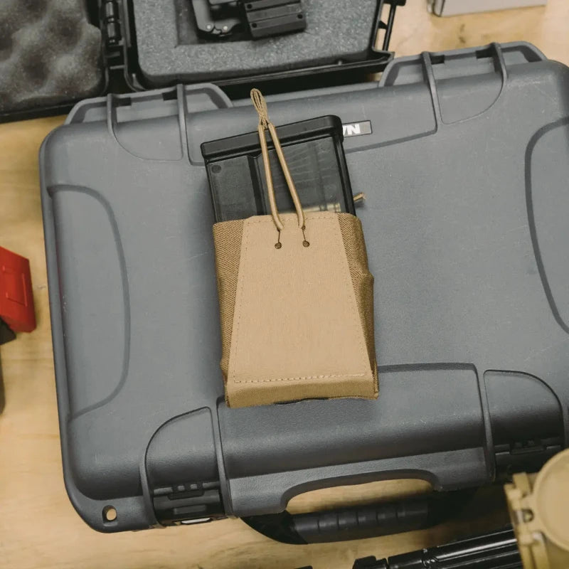 GBRS Group Single Rifle Mag Pouch shown in flatlay with magazine inserted | Minimal MOLLE and belt-compatible pouch made from laser-cut Squadron laminate with 4" poly elastic retention, ideal for 5.56 and 7.62 rifle mags.