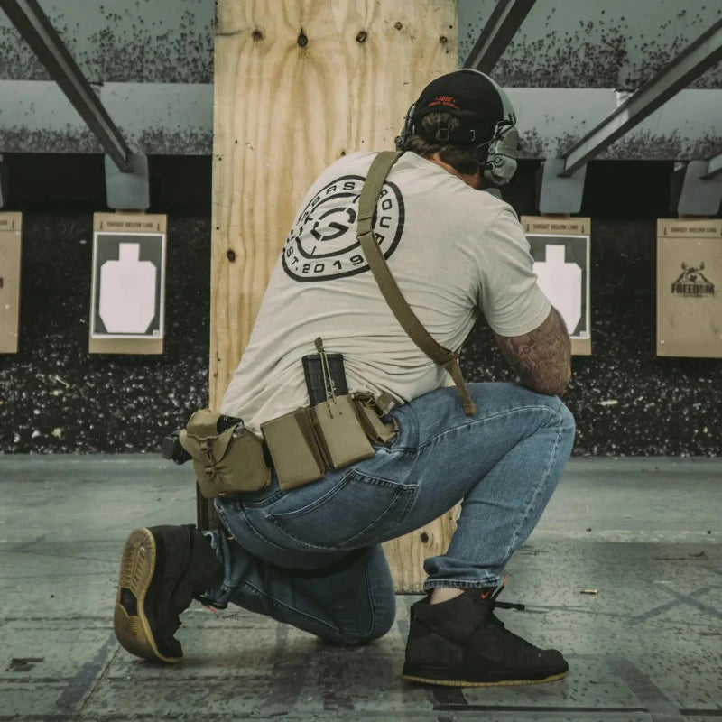 GBRS Group Single Rifle Mag Pouch mounted on tactical belt with magazine inserted | Laser-cut Squadron laminate low-profile belt/MOLLE pouch for 5.56 and 7.62 mags, 4" poly elastic retention and removable bungee for fast, snag-free reloads.