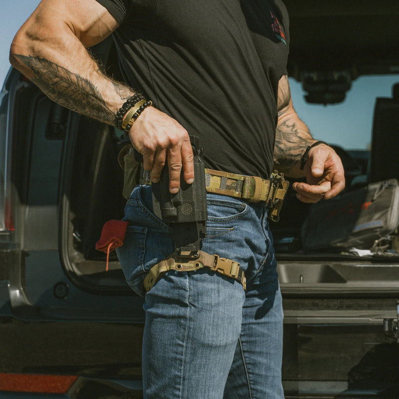 GBRS Group tactical leg strap worn with drop holster and battle belt setup, adjustable Tegris reinforced thigh strap compatible with True North Concepts MHA for improved draw stability during range training, law enforcement duty, and tactical operations made in the USA