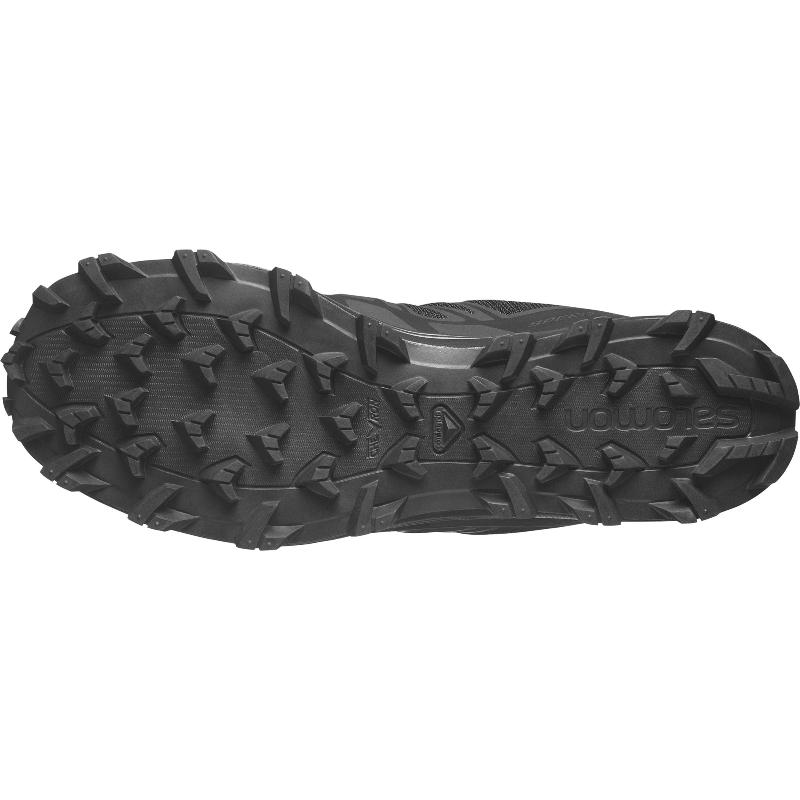 Bottom sole view of Salomon SPEED ASSAULT 2 tactical boots in black showing aggressive rubber tread for superior traction on mud, sand, and wet terrain. Lightweight, quick-drying tactical footwear built for military, law enforcement, and training use.