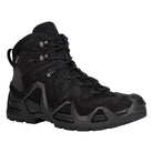 Angled front view of the LOWA Zephyr MK2 GTX Mid in Black highlighting the reinforced toe, supportive MONOWRAP frame, and tactical lacing system.