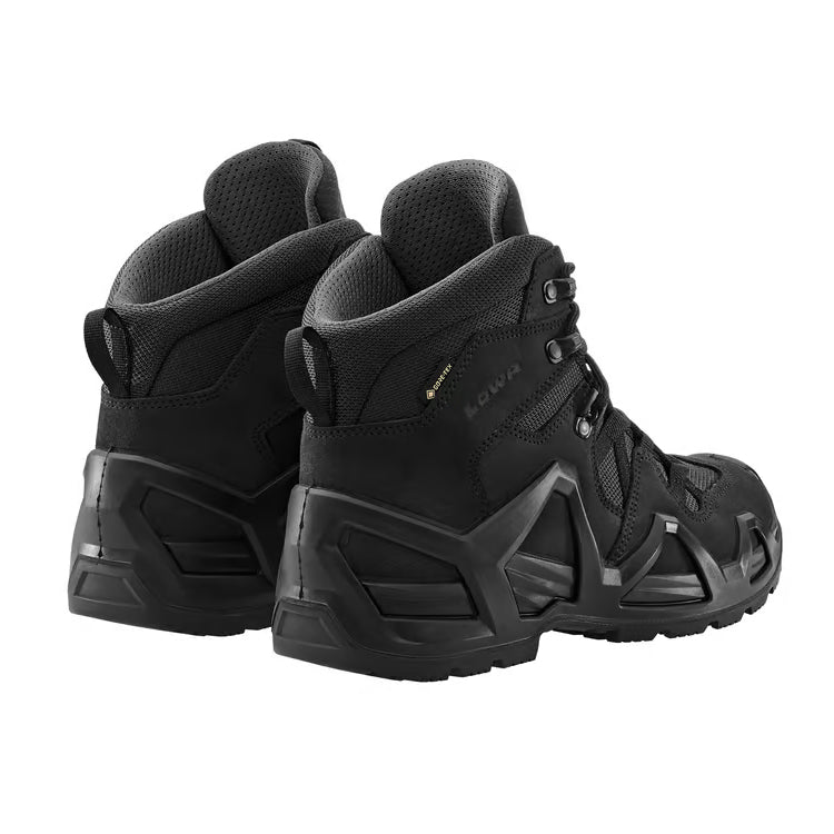 Rear view of a pair of LOWA Zephyr MK2 GTX Mid boots in Black highlighting the supportive heel counters and pull loops.