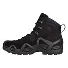 Side profile of the LOWA Zephyr MK2 GTX Mid in Black showing the mid-height design, MONOWRAP support frame, and rugged tactical outsole.
