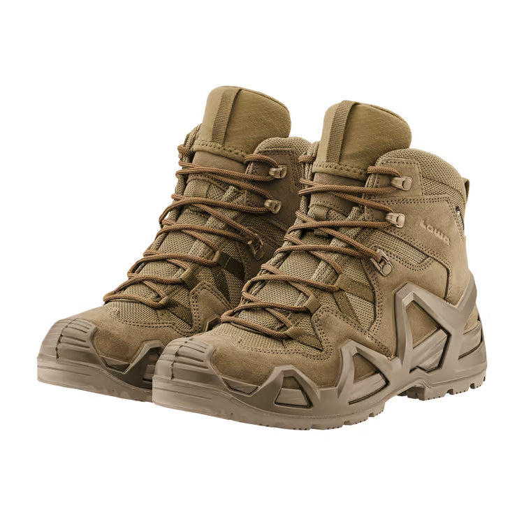 Angled view of a pair of LOWA Zephyr MK2 GTX Mid tactical boots in Coyote showcasing the durable suede upper and all-terrain outsole.