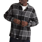 Larkspur Flannel Shirt worn by male model, styled for cool weather with casual tactical layering and clean, rugged Vans style.