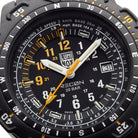 Close-up detail of the Luminox RECON Point Man 8820 Series Heritage dial, highlighting the illuminated hour markers, tachymeter scale, navigation bezel indicators, and precision Swiss movement layout designed for tactical field use and land navigation.