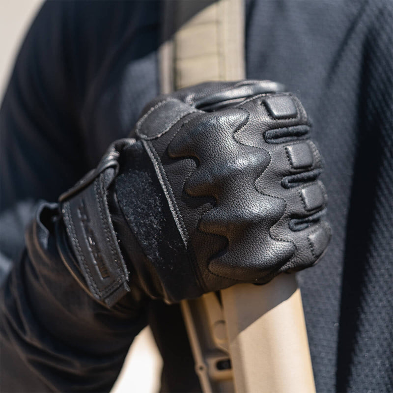 Magpul Breach Glove 2.0 Black flame resistant tactical gloves worn in field scenario highlighting D3O knuckle protection and impact resistant design