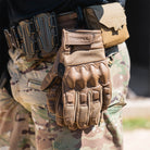 Magpul Breach Glove 2.0 Coyote flame resistant tactical gloves hanging from duty belt as part of a modular tactical kit setup