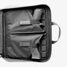 Magpul DAKA Double Pistol Case Black interior right panel showing two stretch retention pistol sleeves for subcompact compact and full size handguns