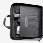 Magpul DAKA Double Pistol Case Black interior left panel with eight magazine retention bands divider pocket and zippered document storage
