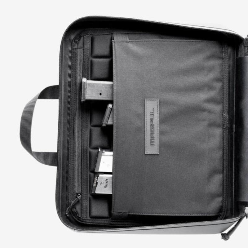 Magpul DAKA Double Pistol Case Black interior left panel with eight magazine retention bands divider pocket and zippered document storage
