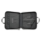 Magpul DAKA Double Pistol Case Black open showing dual pistol sleeves magazine retention bands and internal organization compartments unloaded