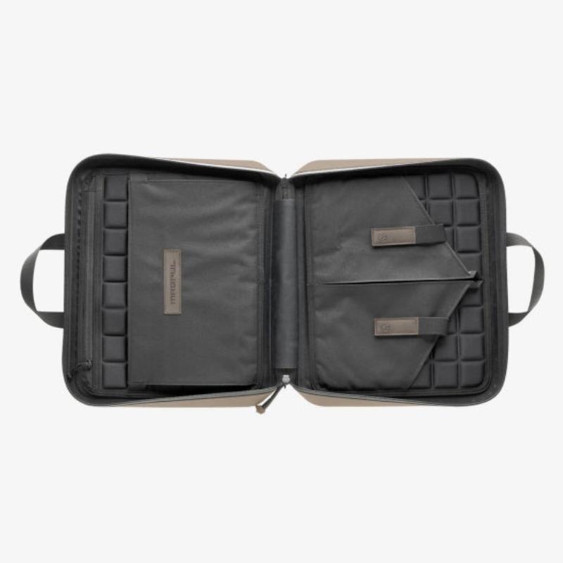 Magpul DAKA Double Pistol Case Flat Dark Earth open showing dual pistol sleeves magazine retention bands and internal loadout organization unloaded