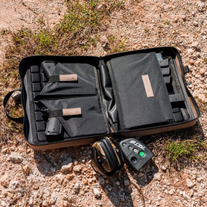 Magpul DAKA Double Pistol Case Flat Dark Earth being used for dual pistol transport at the range with magazines and accessories organized inside