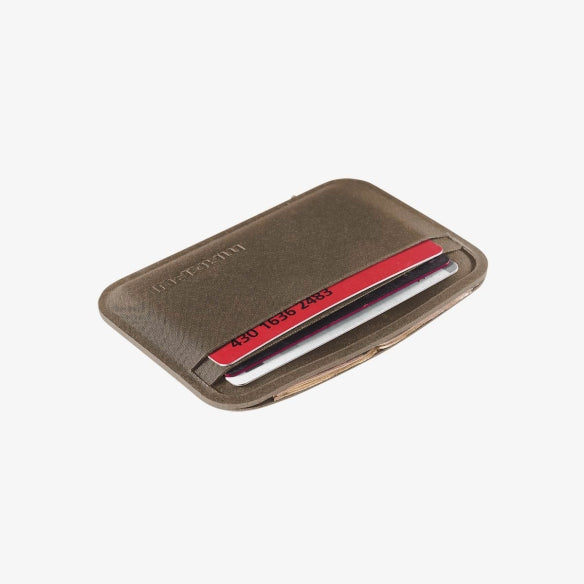 Magpul DAKA Everyday Wallet Flat Dark Earth holding cards and folded cash showing increased daily carry capacity