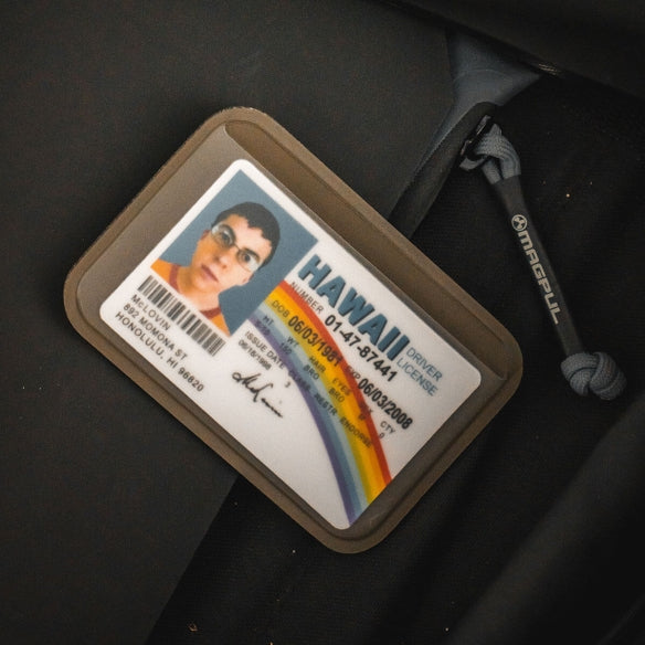 Magpul DAKA Everyday Wallet Flat Dark Earth carried in front pocket showing low bulk everyday carry profile