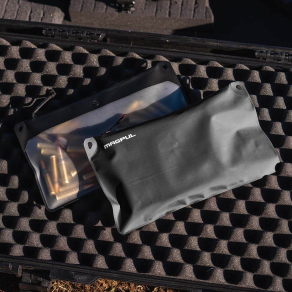 Magpul DAKA Lite Pouch Medium Black holding electronics tools and emergency gear inside backpack for lightweight field organization