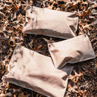 Magpul DAKA Lite Pouch Medium Flat Dark Earth holding emergency gear electronics and tools in lightweight travel setup