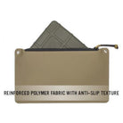 Magpul DAKA Pouch Medium close up showing anti slip textured polymer fabric designed for secure grip in wet conditions and rugged waterproof gear organization