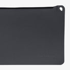 Magpul DAKA Pouch Medium Grey showing reinforced carabiner pass through for attaching to travel bags range kits or marine gear setups