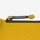 Magpul DAKA Pouch Small Yellow showing YKK AquaGuard zipper and 550 paracord pull for quick glove friendly access