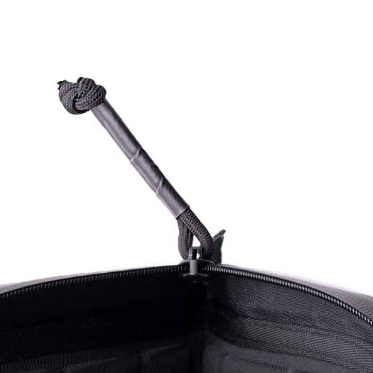 Magpul DAKA Single Pistol Case Black close up of 550 paracord zipper pull with heat shrink tubing for glove friendly access