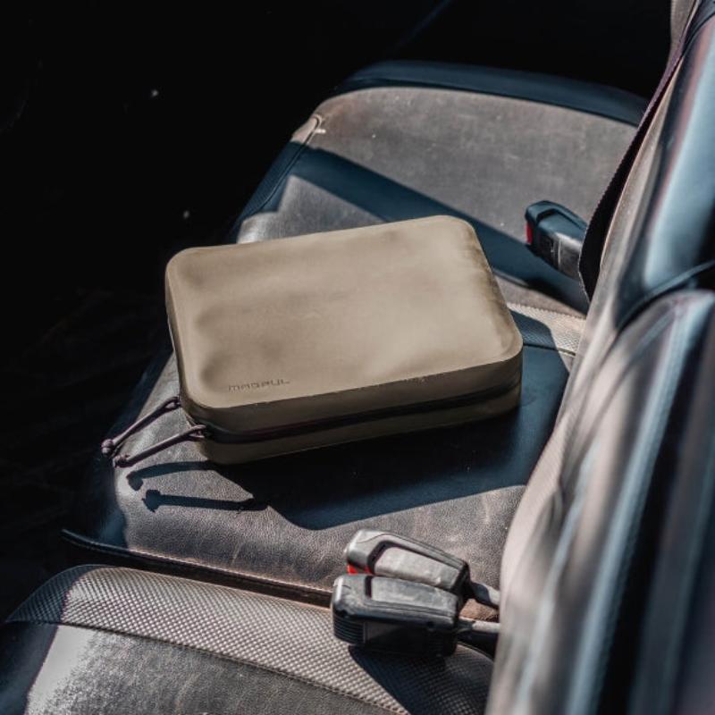 Magpul DAKA Utility Organizer Large Flat Dark Earth used as vehicle admin pouch storing tools documents and essential gear