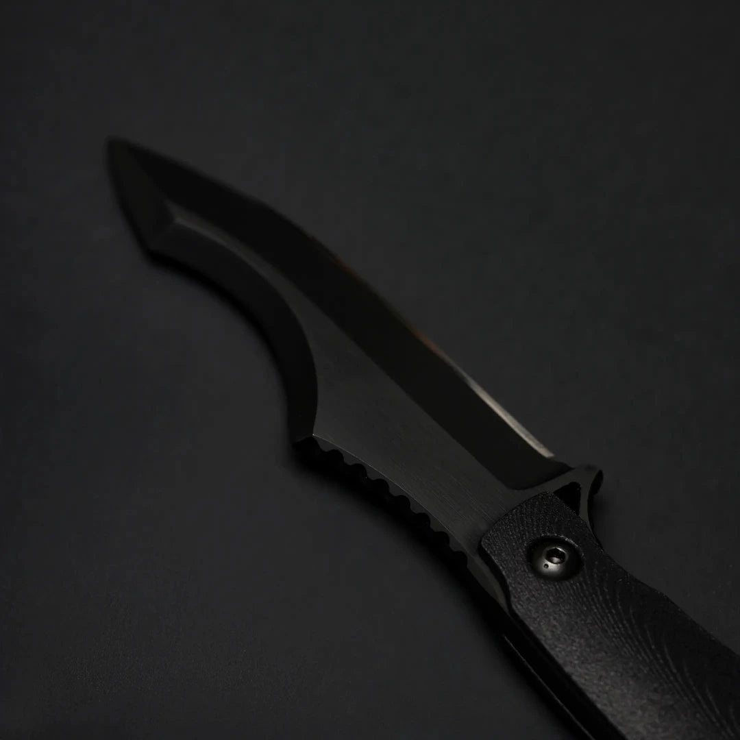 Close up of Dynamis Alliance Mid Knight Crusader MAGNACUT blade showing Improved DLC coating and precision grind lines