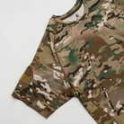 Close-up detail of the short sleeve MultiCam range shirt showing breathable performance fabric and reinforced flatlock stitching for tactical durability