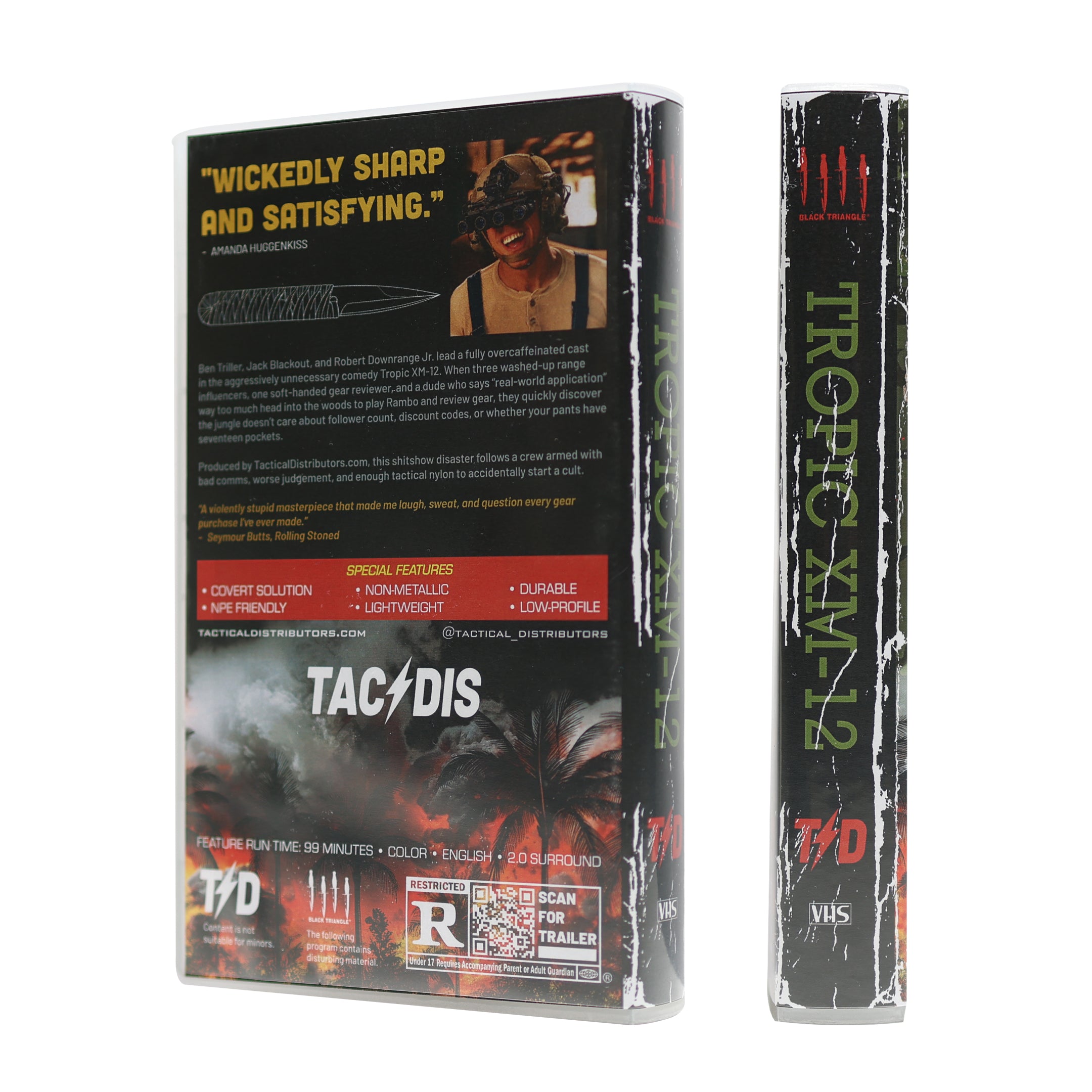 TAC/DIS Tropic XM-12 VHS case shown from the back and spine, sealed in plastic wrap on a white background.