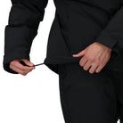 Close-up of the Outdoor Research Allies Colossus II Parka showing adjustable bottom hem elastic cinch, designed to seal out wind and snow, lock in insulation, and provide a customizable fit for Arctic expeditions, tactical military missions, and extreme cold weather survival.