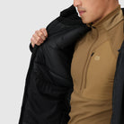 Interior view of the Outdoor Research Allies Colossus II Parka showing quilted insulated lining, designed for maximum heat retention, breathability, and comfort in Arctic expeditions, tactical military missions, and extreme cold weather survival.