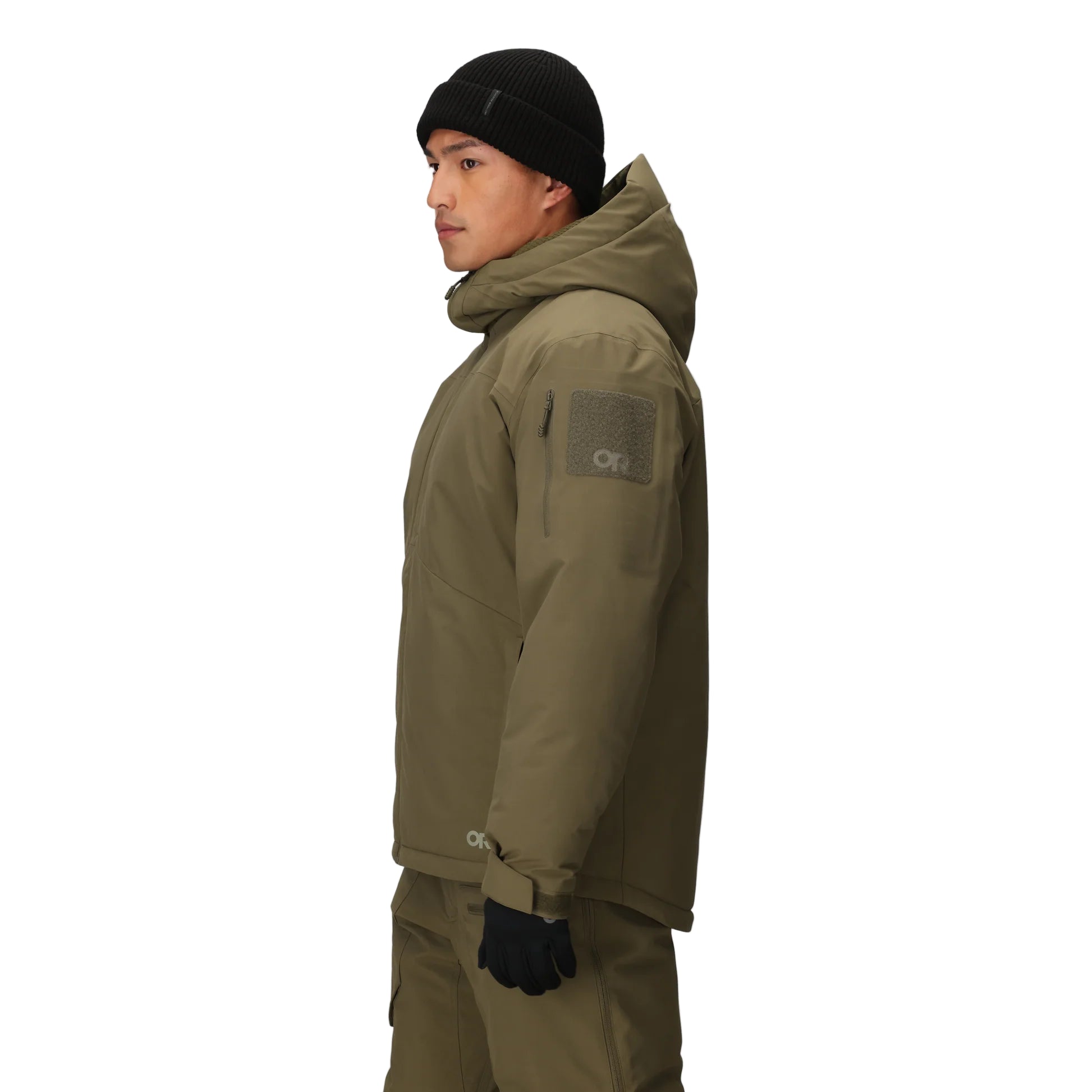 Three-quarter side view of the Outdoor Research Allies Colossus II Parka in Ranger Green, showing tactical pocket layout, shoulder ID patch panel, and rugged waterproof outer shell.