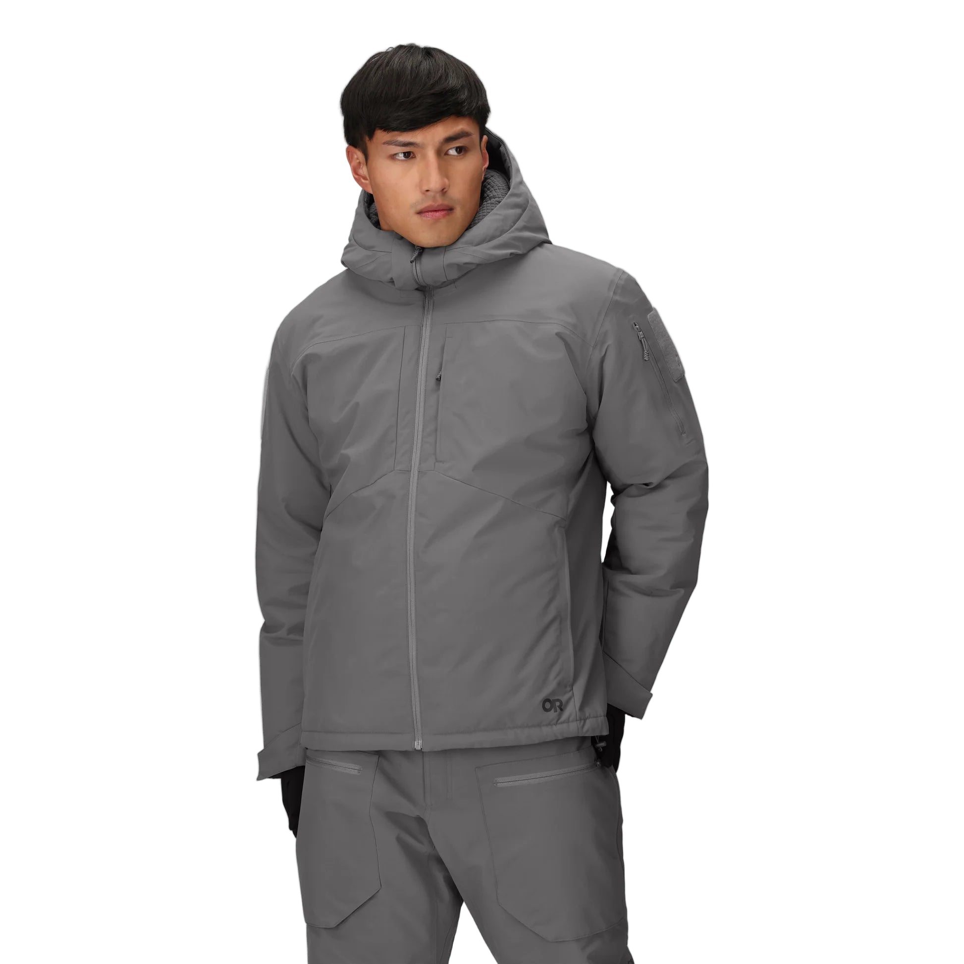 Front view of the Outdoor Research Allies Colossus II Parka in Wolf Grey, shown on a model with YKK® AquaGuard zipper, insulated hood, and operational pocket layout.
