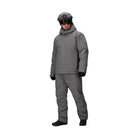 Full body view of the Outdoor Research Allies Colossus II Parka in Wolf Grey, shown on a model with operational cut, tactical design, and extreme cold weather performance for Arctic use.
