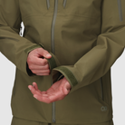 Close up of the Outdoor Research Allies Mountain II Jacket in Ranger Green showing the hook and loop arm cuff adjustment, reinforced Cordura ripstop fabric, and weatherproof AscentShell construction designed for military, law enforcement, and alpine professionals needing a secure, weather tight fit in extreme conditions.