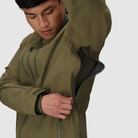 Close up of the Outdoor Research Allies Mountain II Jacket in Ranger Green showing the underarm zipper vents, highlighting the breathable AscentShell waterproof design, Cordura ripstop durability, and articulated combat fit built for military, law enforcement, and alpine professionals needing fast heat regulation during high output missions.