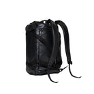 Outdoor Research CarryOut Duffel 40L in Black shown on its side with backpack straps attached | Rugged convertible duffel with 40 liter capacity PU coated 420D ripstop nylon shell compression straps and modular carry design — best black duffel bag with backpack straps for tactical travel missions and outdoor use