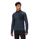 Front view of the Outdoor Research Deviator Fleece Half Zip in Atlantic deep navy, shown on a model with athletic fit, half-zip vent, and breathable hybrid construction for alpine performance.