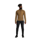 Full body view of the Outdoor Research Deviator Fleece Half Zip in coyote, shown on a model with ergonomic fit and streamlined hybrid design built for alpine, tactical, and cold-weather missions.